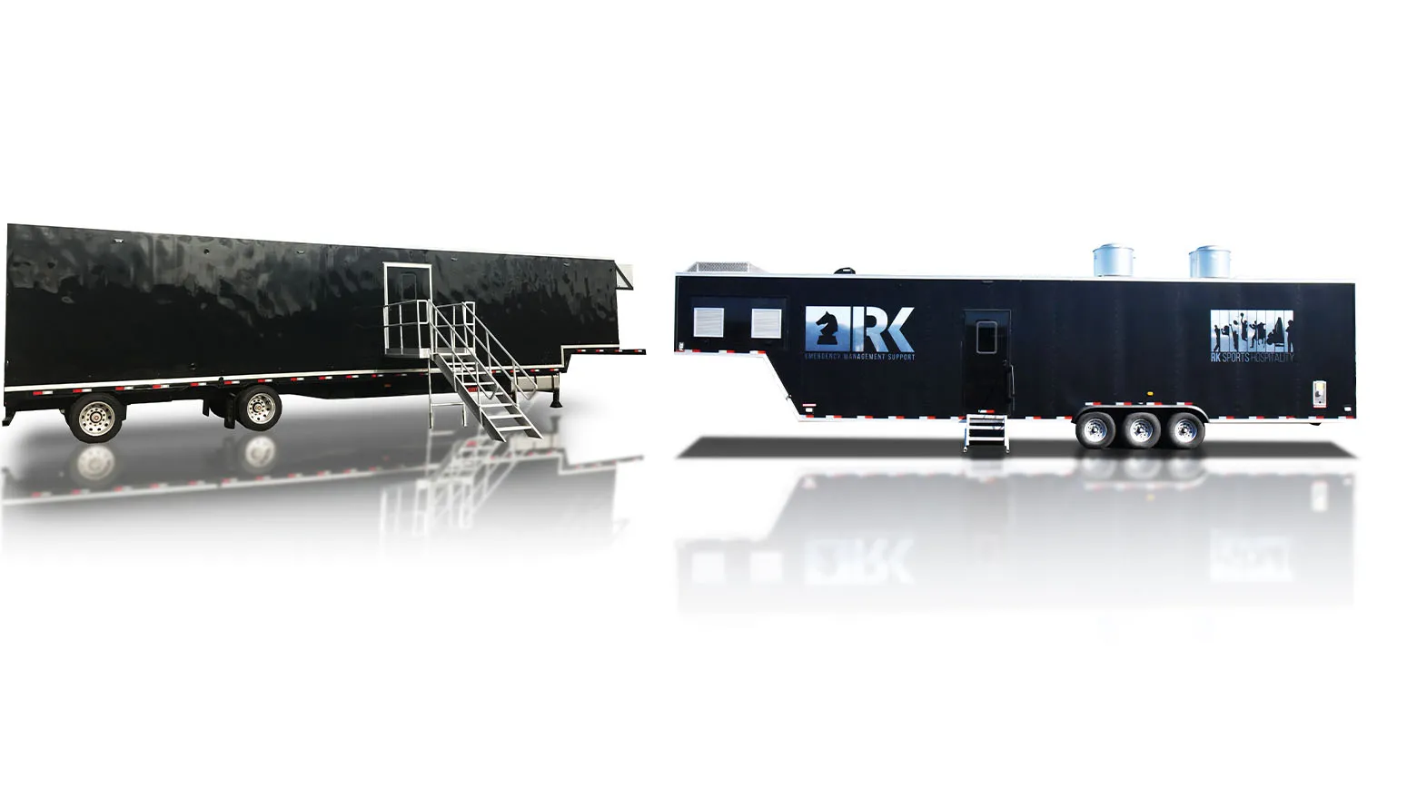 Two large black trailers with metal stairs, one labeled RK Emergency Management Support and the other RK Sports Hospitality.